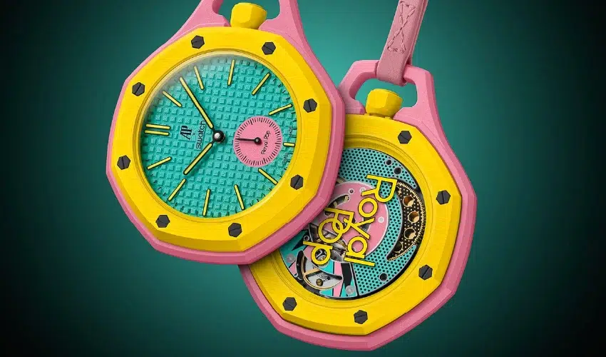 Audemars Piguet x Swatch Royal Pop Blaue Acht pocket watch featuring a yellow bioceramic case, teal Petite Tapisserie dial, and pink small seconds sub-dial.