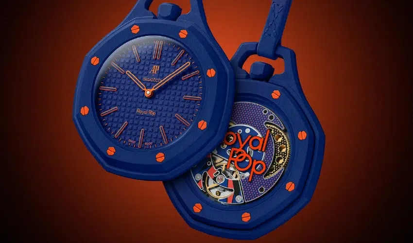 Audemars Piguet x Swatch Royal Pop Orenji Hachi pocket watch with a dark blue bioceramic case, blue dial, and bright orange hands and markers.
