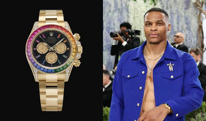Russell Westbrook wearing an 18k gold Rolex Daytona Rainbow watch in a denim suit.